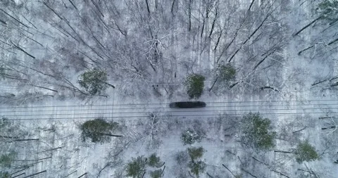 Drone. Aerial. Train going  white winter forest. Vídeos de archivo 150980425