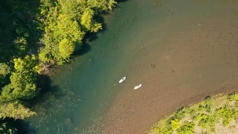 Drone Aerial Two People on Paddle Boards SUP on River in Oregon Columbia Gorge Video stock 280702875