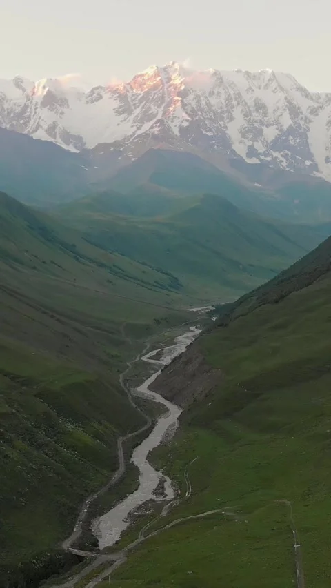 Drone aerial vertical view of Ushguli valley with winding river and majesti.. Stock Footage 311570419