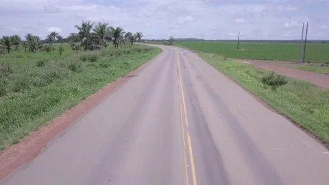 Drone aerial view of BR 163 road and soybeans farm during soy harvest in Amazon. Stock Footage 147194714