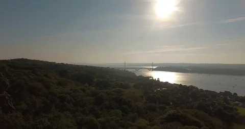 Drone aerial view of the Brest harbour and the Iroise bridge during the sunset Stock Footage 129100130