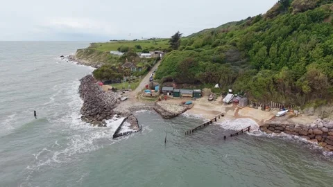 Drone Aerial View of Castlehaven Beach Sea Defense and Slipway Isle of Wight Stock Footage 336944866