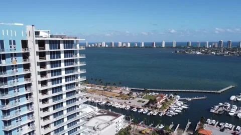 Drone Aerial View of Coastal Development and Marina in Palm Beach, Florida Stock Footage 305571333