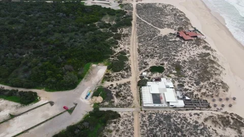 Drone Aerial View Costa da Caparica beach bar in Portugal Stock Footage 145938216
