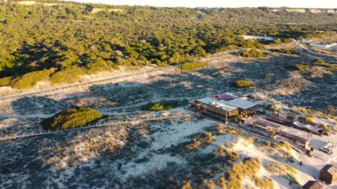 Drone Aerial View Costa da Caparica beach bar in Portugal Stock Footage 145975002