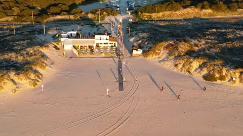Drone Aerial View Costa da Caparica beach bar in Portugal Stock Footage 145975250