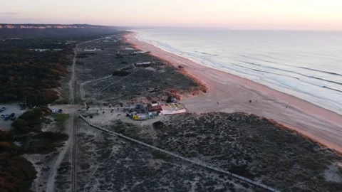 Drone Aerial View Costa da Caparica beach bar in Portugal Stock Footage 146102394