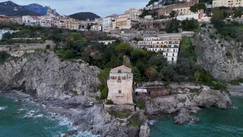 Drone Aerial view of Crestarella Tower and Vietri sul Mare town on Amalfi Coast Stock Footage 325388930