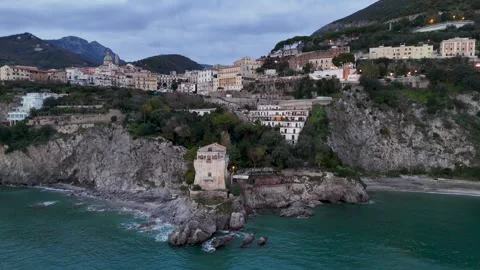Drone Aerial view of Crestarella Tower and Vietri sul Mare town on Amalfi Coast Stock Footage 325389045