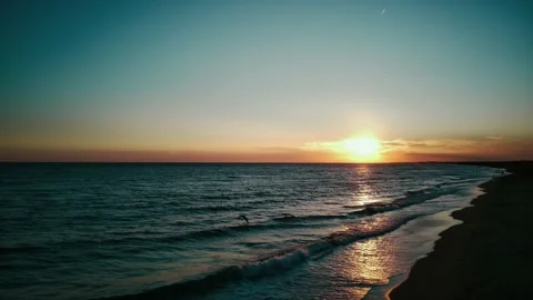 Drone aerial view dolly side panning over paradise beach sunrise, Stock Footage 202036872