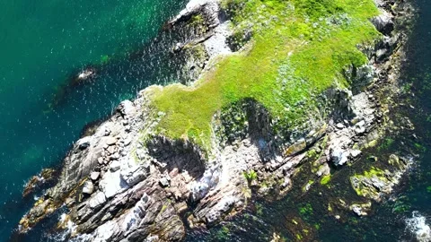 Drone aerial view during the day  on the Saint Thomas rocks Saint Toma island Stock Footage 309678419