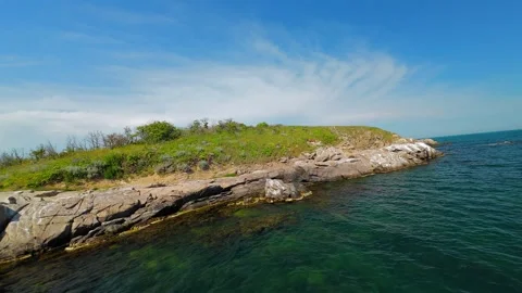 Drone aerial view during the day  on the Saint Thomas rocks Saint Toma island Stock Footage 309678441