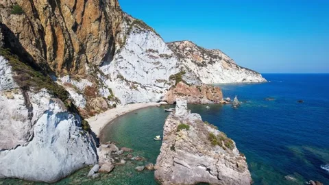 Drone aerial view with Emerald Crystal clear water on island coast with boats Stock Footage 172080437