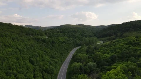 Drone aerial view empty asphalt road in summer day on mountain range 스톡 동영상 244884319