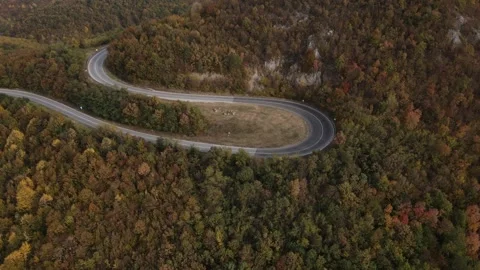 Drone aerial view empty asphalt road in autumn day on mountain range Video stock 254024190