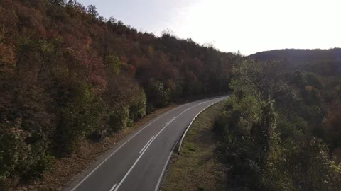 Drone aerial view empty asphalt road in autumn day on mountain range Stock Footage 254519973