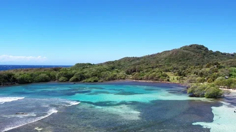 Drone aerial view of an empty beach in roatan honduras Stock Footage 237328486