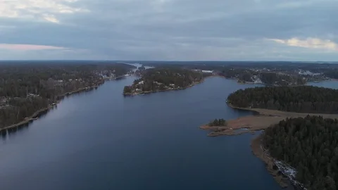Drone aerial view flying backward over archipelago and small islands Stock Footage 104526340