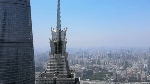 Drone aerial view flying close to modern skyscraper Shanghai downtown Stock-Footage 155420634