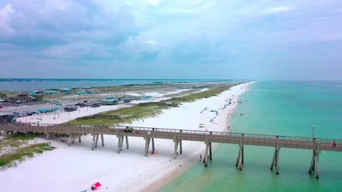 Drone aerial view flying down the side of the Pier in Navarre Beach Stock Footage 213130054