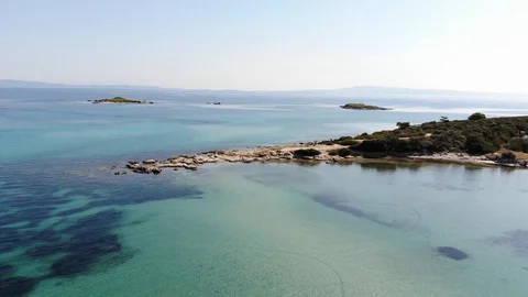 Drone aerial view flying over blue lagoon with turquoise water Stock Footage 91968898