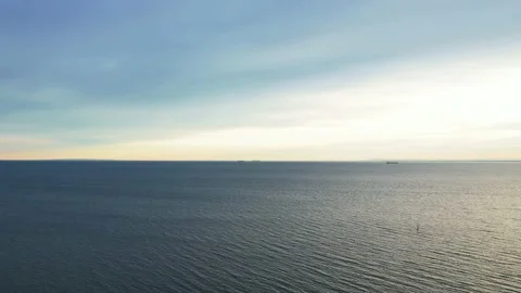 Drone aerial view flying over the sea to the skyline Stock Footage 209130216