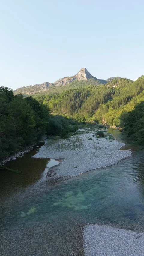 Drone Aerial View Flying Over Wooden Footbridge Towards Shallow Neretva River  Stock Footage 343674140