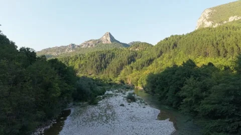 Drone Aerial View Flying Over Dried Neretva River Bed Revealing Exposed Gravel  Stock Footage 343674445