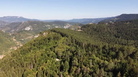 Drone Aerial View Flying Over Dense Trebevic Forest Revealing Construction Crane Stock-Footage 343675402