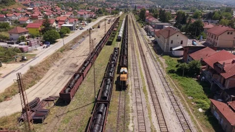 Drone Aerial View Flying Over Railway Tracks and Freight Train Wagons  Stock-Footage 343675633