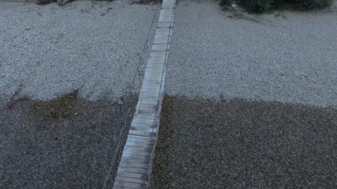 Drone Aerial View Flying Overhead Wooden Suspension Footbridge  Stock-Footage 343674723