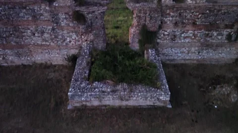 Drone aerial view flying sideways over the ancient Roman walls of Nicopolis in Stock Footage 345168274