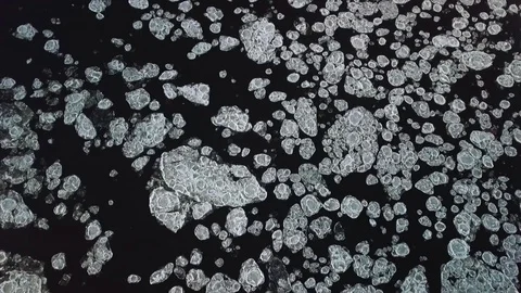 Drone aerial view flying in winter over the river full of floes Stock Footage 102374964
