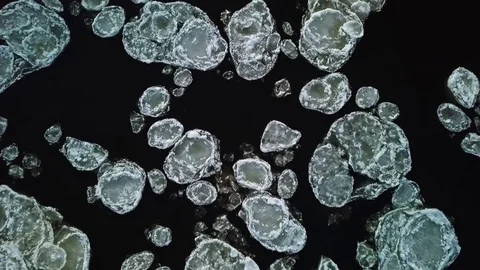 Drone aerial view flying in winter over the river full of floes Stock Footage 102375174