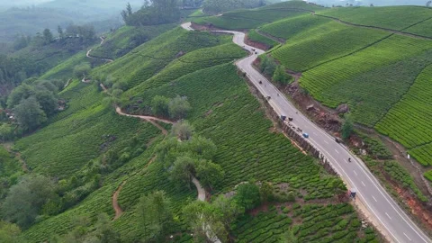 Drone aerial view of Gap Road through tea plantations in Munnar Kerala India 스톡 동영상 332690718