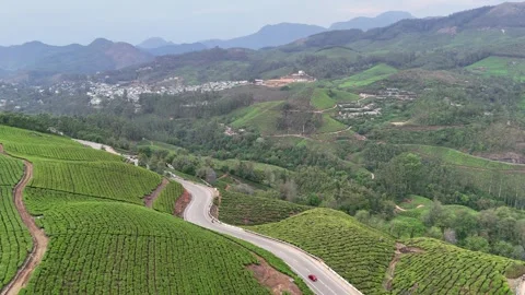 Drone aerial view of Gap Road through tea plantations in Munnar Kerala India 스톡 동영상 332691915