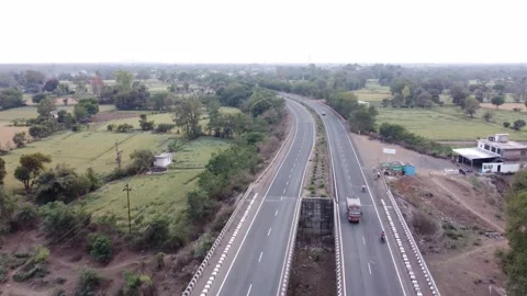 Drone aerial view of a generic looking well maintained national highway of Stock Footage 240803051