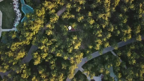 Drone aerial view to green park in town Stock Footage 201216341