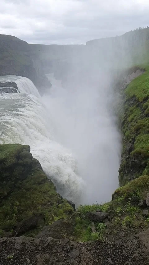 Drone aerial view of gullfoss watterfall in iceland on a cloudy summer day Stock Footage 280292539