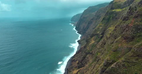 Drone aerial view at High cliff ocean coast of Madeira Island in Portugal Stock Footage 244633565