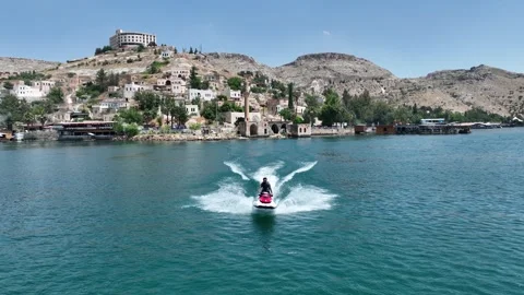Drone Aerial View of Jet Ski Athlete Performing on the Halfeti River, May, 11, Video stock 336453918