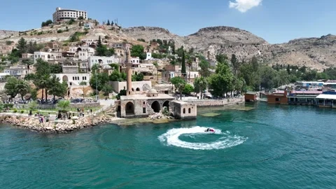 Drone Aerial View of Jet Ski Athlete Performing on the Halfeti River, May, 11, Stock Footage 336454157