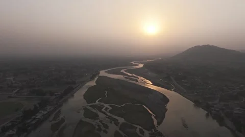 Drone Aerial View of Kabul River Riverbed in Jalalabad Afghanistan at Sunset Stock Footage 319821357