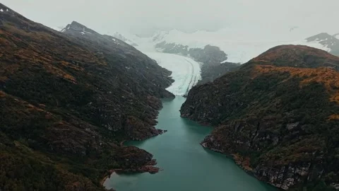 Drone Aerial View of a Lake Between Mountains Stock Footage 315098452