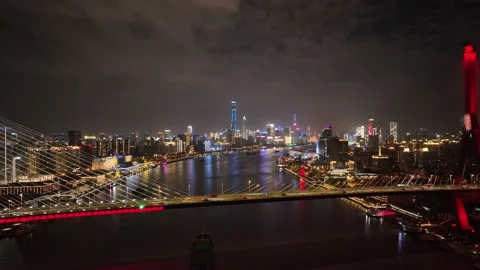 Drone aerial view of landmark bridge city and city skyline in night Stock-Footage 166136408