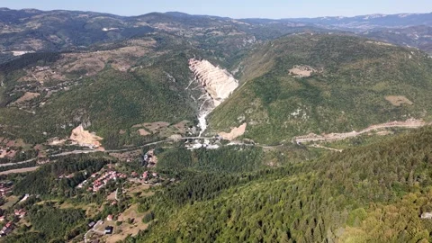 Drone Aerial View Looking from Trebevic Mountain Towards Open Pit Quarry  Stock Footage 343676042