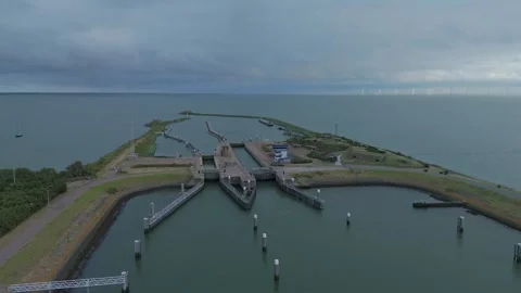 Drone aerial view of the Lorentz Locks on the Afsluitdijk Stock Footage 343838907