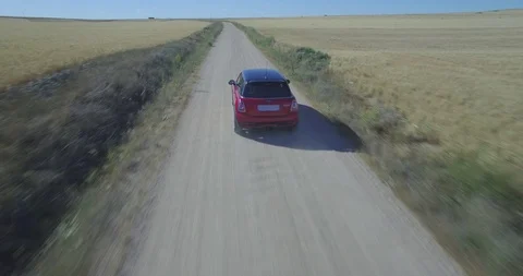 Drone aerial view of Mini Cooper car while driving Stock Footage 106108328
