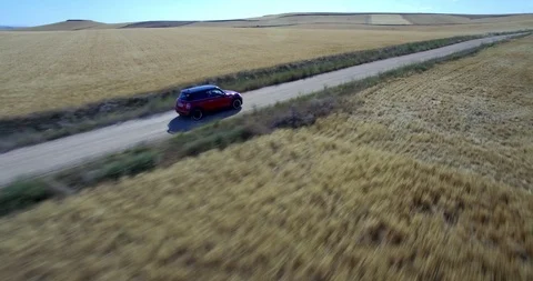 Drone aerial view of Mini Cooper car while driving Stock Footage 106108665