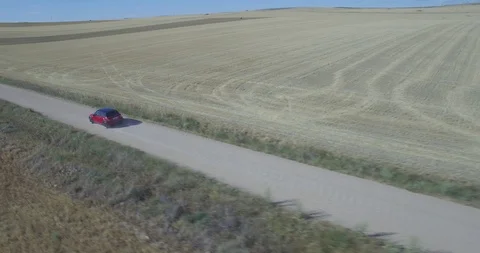 Drone aerial view of Mini Cooper car while driving Stock Footage 106109732
